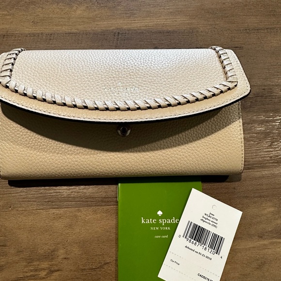 Kate Spade -Large handbag with matching wallet. Kept is duster bag - Picture 2 of 10